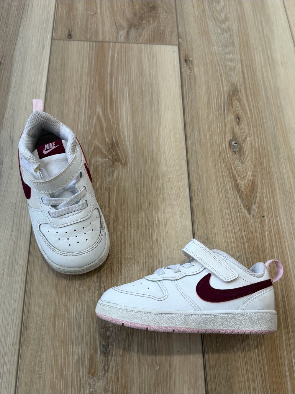 Nike Kids White Sneakers with Burgundy Swoosh and Pink Trim